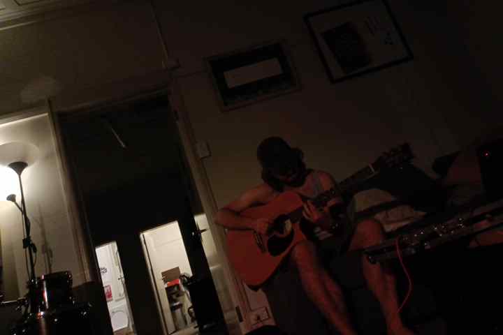 cass playing acoustic guitar