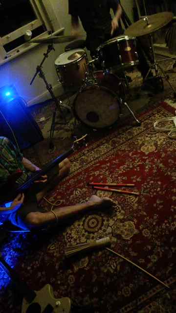 Nick and Andrew playing drums and bass respectively